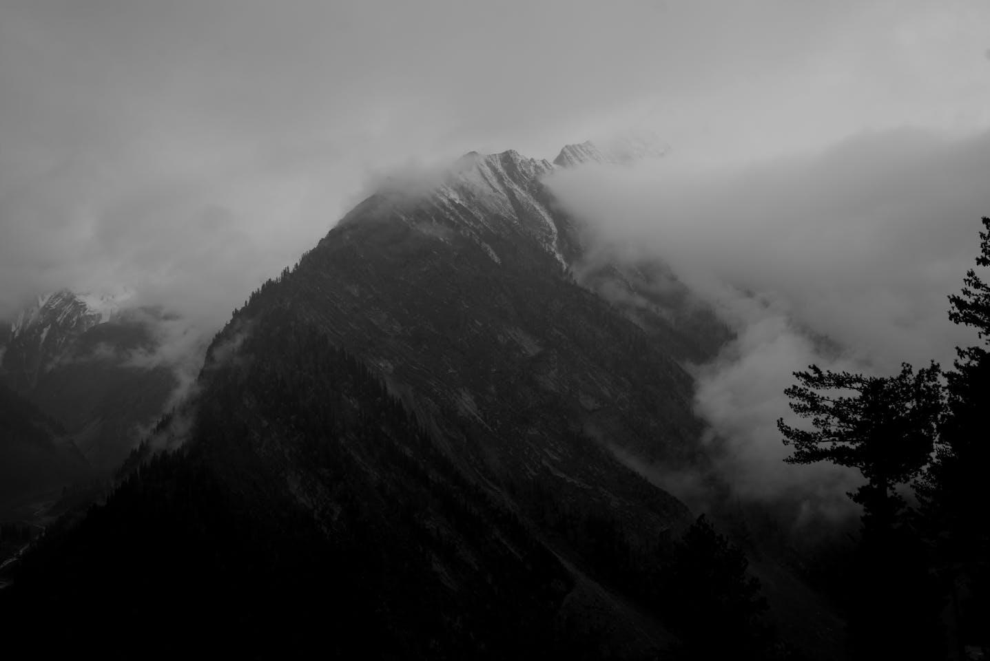 A mountain with clouds